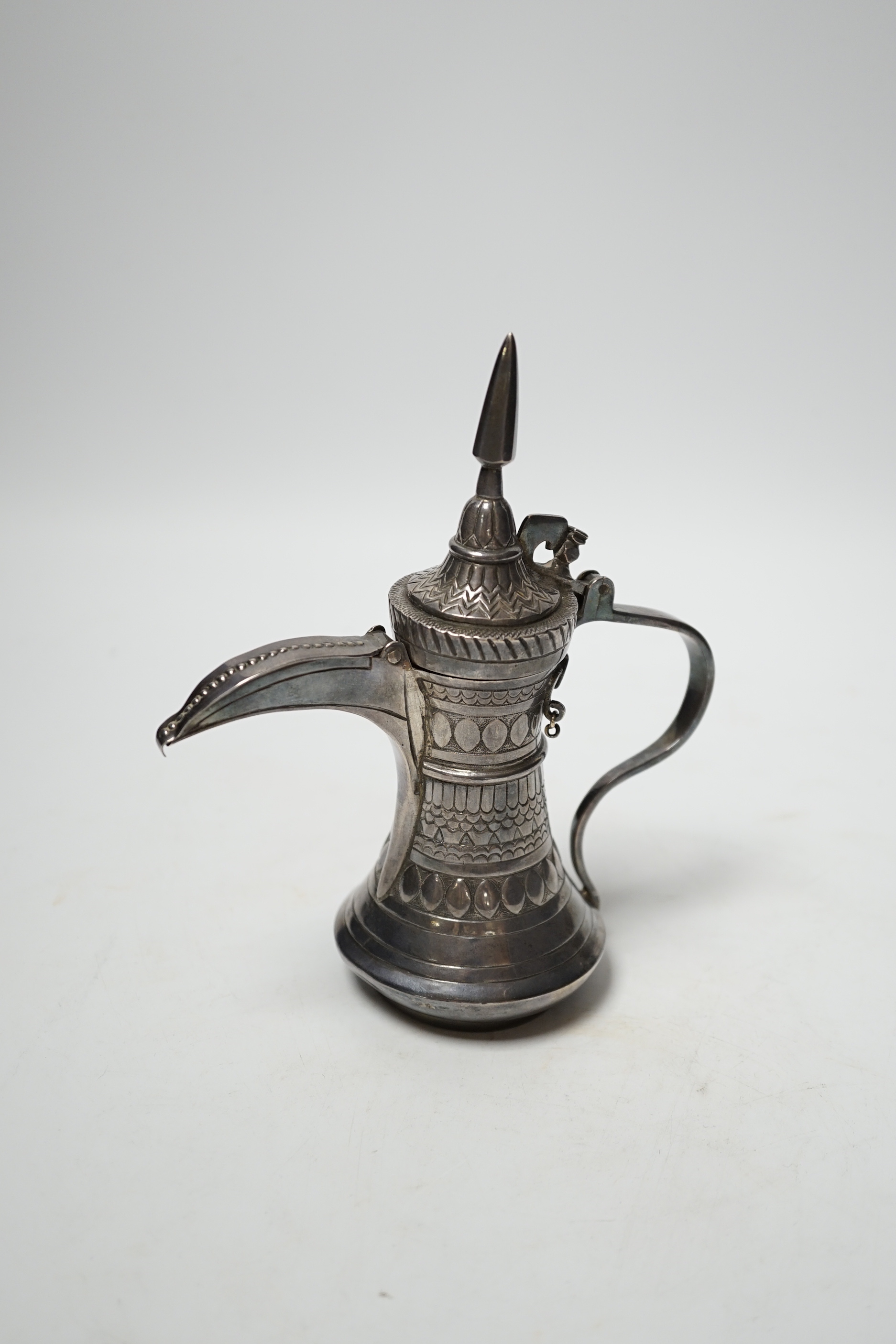 A small Persian white metal dallah, 16cm